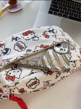 Hello Kitty White Printed Cell Phone Pouch with Red Accent